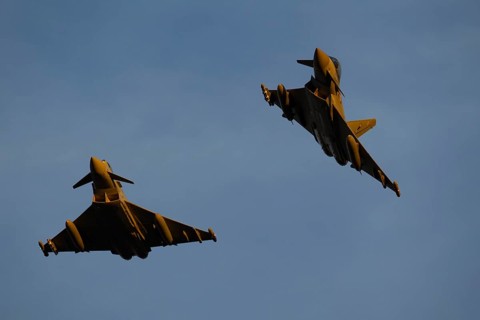 Eurofighter Typhoon two military fighter jet aircraft of the Royal air force RAF flying in