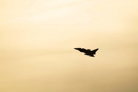 Eurofighter Typhoon silhouette of a military fighter jet aircraft of the Royal air force RAF flying