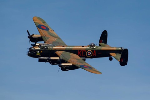 Avro Lancaster warbird military aircraft in Royal air force RAF colours flying, England, United