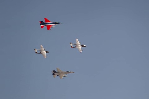 General Dynamics F-16 Fighting Falcon and de Havilland Vampire military jet aircraft of the Royal