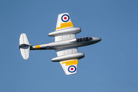 Gloster Meteor military jet aircraft in Royal air force RAF colours flying, England, United Kingdom