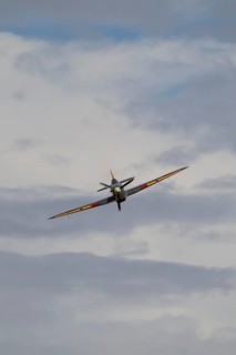 Hawker Hurricane warbird military aircraft in Royal air force RAF colours flying, England, United