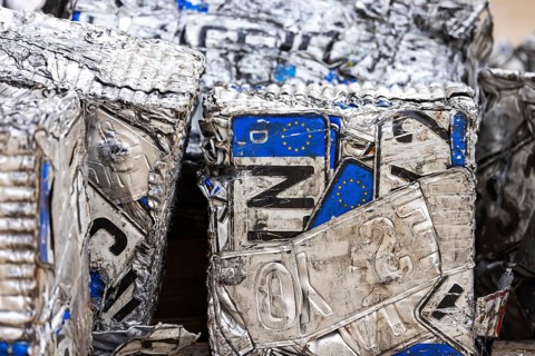 Cubes made from scrap metal, disused car licence plates. Symbolic photo. Stuttgart,