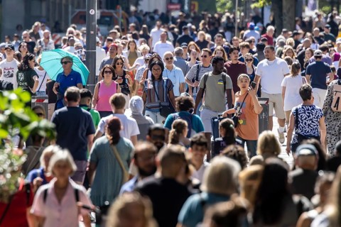 In the sunshine, many people stroll through Stuttgart's Königstraße pedestrian zone. Stuttgart,