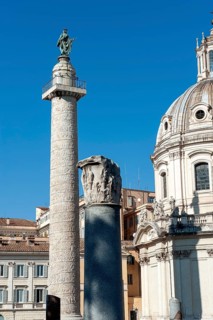 Left 40 metre high Trajan's Column Victory Column Column of honour for Roman Emperor Trajan, at the