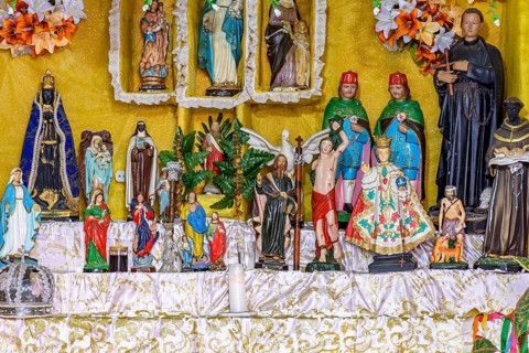 Images of saints and entities present on an Afro-Brazilian altar in Congado in Minas Gerais, Belo