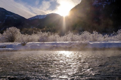 Sunrise in the forest on the young Isar in winter between Wallgau and Vorderriss, Tölzer Land,