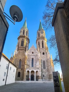 High Gothic church towers rise symmetrically into the clear blue sky, Klosterneuburg Lower Austria