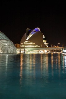 Valencia Spain Modern building reflected in the calm water at dusk Opera City of Arts and Sciences