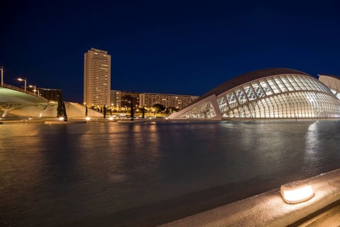Valencia Spain Night scene with modern building and skyscraper on the calm water City of Arts and