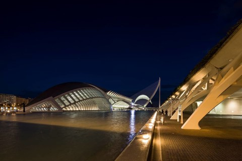 Valencia Spain Innovative urban structures reflect in the water under a dark sky City of Arts and