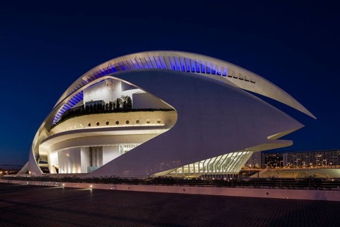 Valencia Spain Futuristically designed building with modern shapes illuminated at night nOpera
