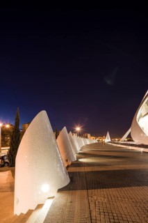 Valencia Spain Modern architectural structure at night with illuminated walkway City of Arts and