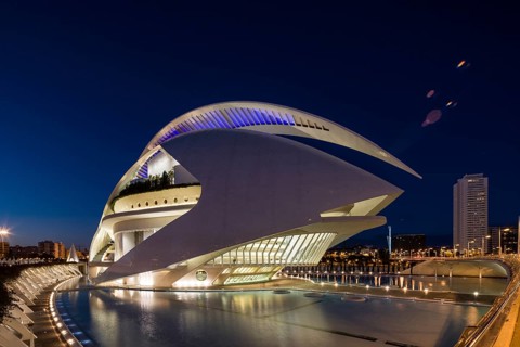 Valencia Spain Futuristic-looking building illuminated at night with dominant blue tones Opera