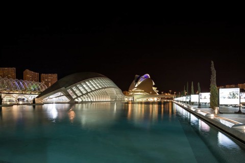 Valencia Spain Nocturnal urban scenery with illuminated modern buildings and water City of Arts and