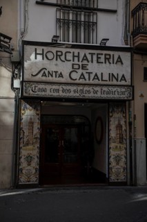 Traditional Valencian restaurant with decorative tiles and characteristic signage