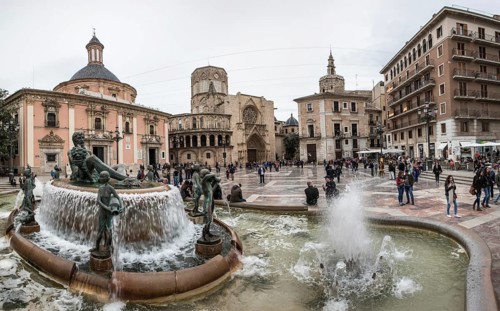 Historic fountain in front of the Virgen de los Desamparados Naval Museum Fuente del Turia fountain