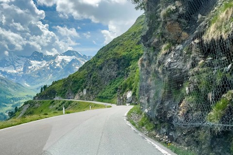 View of alpine road pass road south ramp from to Timmelsjoch Passo del Rombo with right at roadside