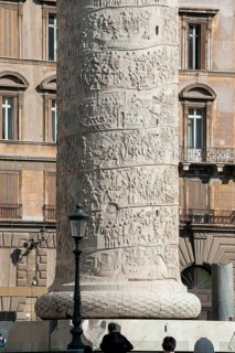 View of part of pedestal and details of spiral marble relief on column of honour Victory Column