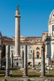 View of part of historic Trajan's Forum with ancient column fragments from Basilica Ulpia in front,