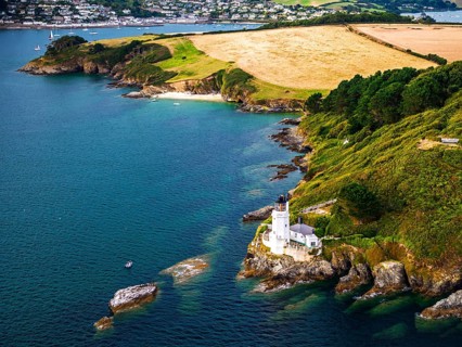 St Anthony Lighthouse from drone, Roseland peninsula, Head circular walk, Cornwall, UK