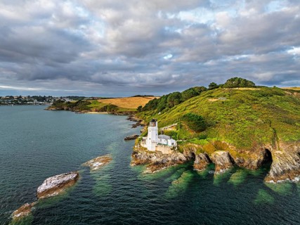 St Anthony Lighthouse from drone, Roseland peninsula, Head circular walk, Cornwall, UK