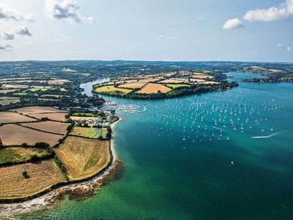 Mylor Churchtown Village from a drone, Carrick Roads, River Fal, Falmouth, Cornwall, UK