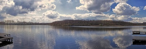 Panorama of a lake (Krickenbecker Seen) with dramatic clouds and calm atmosphere, Nettetal