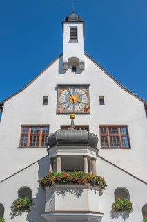 West faÃ§ade with clock and floral decoration, town hall, Kempten, AllgÃ¤u, Bavaria, Germany