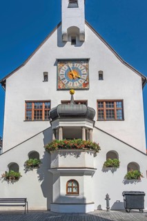 West faÃ§ade with clock and floral decoration, town hall, Kempten, AllgÃ¤u, Bavaria, Germany