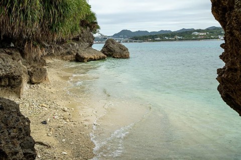 Lover Beach, volcanic rocks and vegetation on the beach of Sesoko-jima, Sesoko Island, Motobu,