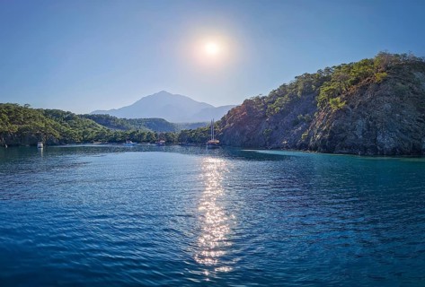 Wonderful Paradise bay of Camyuva, Kemer, Turkey. Scenery sea view to the coast with boats on the
