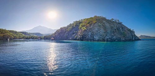 Wonderful Paradise bay of Camyuva, Kemer, Turkey. Scenery sea view to the coast with boats on the