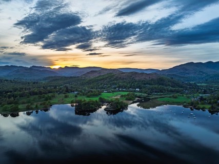 Sunset over Windermere Lake from a drone, Ambleside, Lake District, Cumbria, England, United