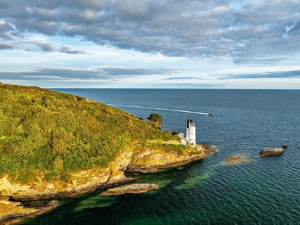 St Anthony Lighthouse from drone, Roseland peninsula, Head circular walk, Cornwall, UK