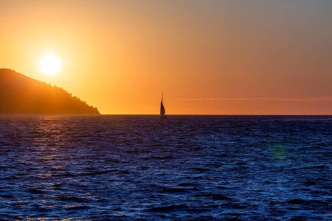Sunset over the sea, sailing ship, near Starigrad, Dalmatia, Croatia