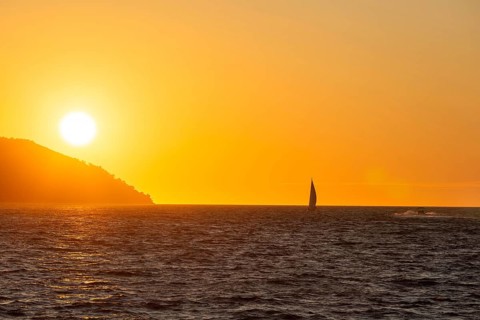 Sunset over the sea, sailing ship, near Starigrad, Dalmatia, Croatia