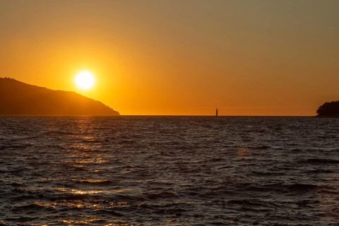 Sunset over the sea, sailing ship, near Starigrad, Dalmatia, Croatia