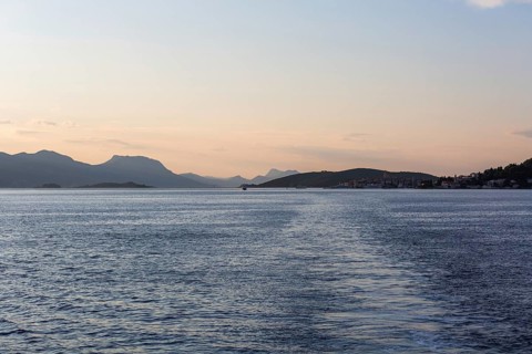 View from the sea to the Makarska mountains in the morning light, near Korcula, Dalmatia, Croatia