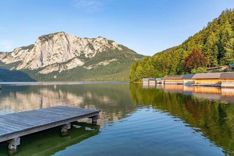 Lake Altaussee with wooden jetties and Trisselwand, Altaussee, Styria, Austria