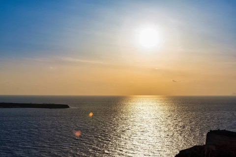 Sunset by the sea, Halo, Cirrus, Oia, Thira, Santorini, Cyclades, Greece