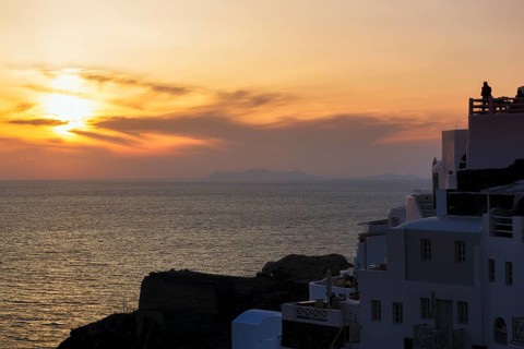 Holiday homes on the edge of the caldera with sea view, sunset, Oia, Thira, Santorini, Cyclades,