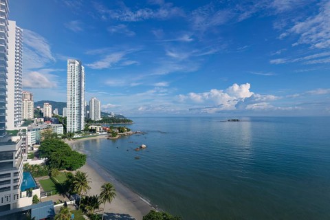 Penang skyline and beach on the Malacca Straits, Penang, Malaysia