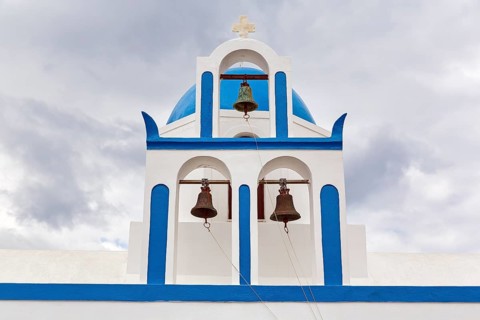 Blue and white bell tower, Mikros Profitis Ilias church, hiking trail from Fira to Oia, Thira,