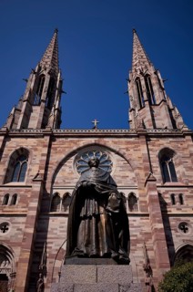 Monument, statue of Charles Emile Freppel, theologian and Bishop of Angers, in front of the church