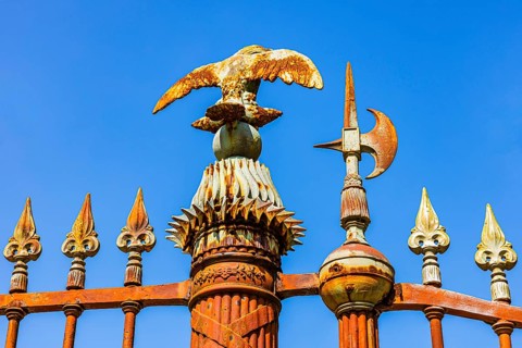 Iron eagle and spears at the entrance gate of Napoleon Bonaparte's summer residence, San Martino,