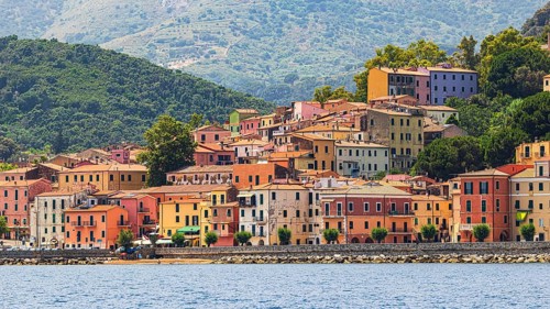 The village of Rio Marina with its pastel-coloured house facades, Elba Island, Tuscan Archipelago