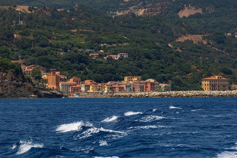 The village of Rio Marina with its pastel-coloured house facades, Elba Island, Tuscan Archipelago