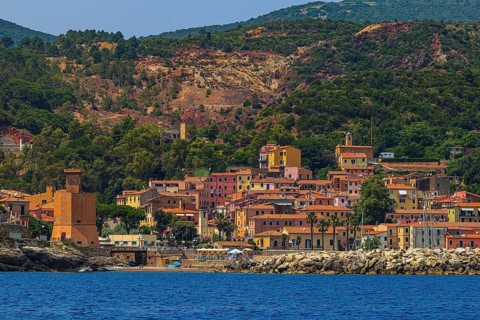 The village of Rio Marina with its pastel-coloured house facades, Elba Island, Tuscan Archipelago