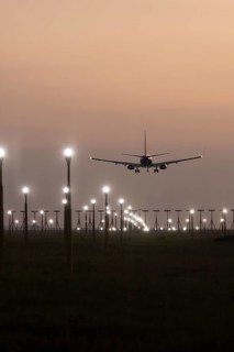 Boeing 737 jet aircraft of Ryanair airlines in flight landing at sunset at London Stansted airport,